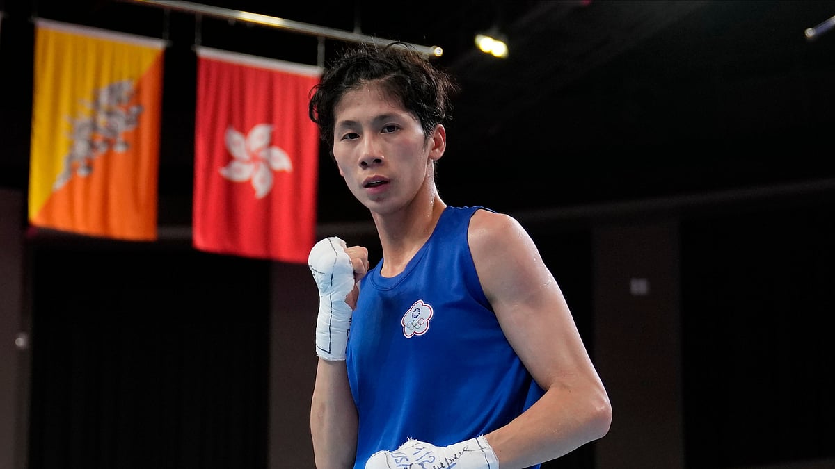  (AP Photo/Aijaz Rahi, File) : FILE - Taiwan's Lin Yu-ting poses after winning against India's Parveen in the Boxing Women's 54-57Kg Semifinal bout during the 19th Asian Games in Hangzhou, China, Wednesday, Oct. 4, 2023.


